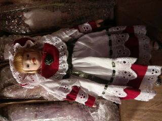 Peabody and Wright,  Ltd.  box of 16 dolls dressed in multiple national costumes c 3