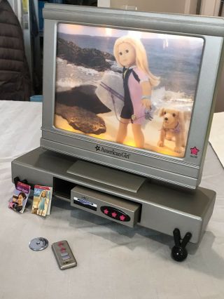 American Girl Tv.  Comes With Dvd Player,  Dvds’ Three Screen Options And Remote.