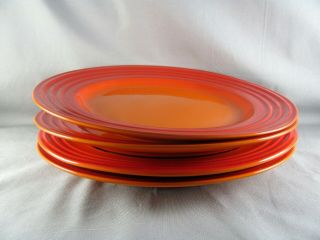 4 Le Creuset Flame Orange Dinner Plates,  12 - 1/8 ",  Volcanic,  Stoneware