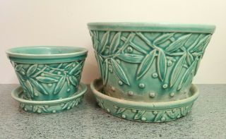Two Vintage Turquoise Mccoy Pottery Hobnail And Leaf Planter And Saucers