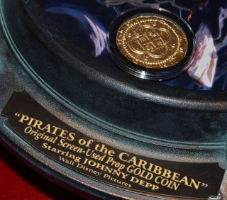 JOHNNY DEPP Signed PIRATES OF CARIBBEAN,  DISNEY PROP Coin,  Porthole DVD UACC 5