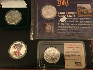 Four Silver American Eagles 1987,  1995,  1999 And 2003 Uncirculated