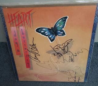 Heart - Ann And Nancy Wilson Signed " Dogs And Butterflies " Album On Cover