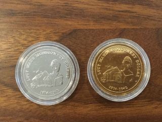 2 Summerside P.  E.  I.  L.  M.  Montgomery Trade Dollars Rhodium Plated & Gold Plated