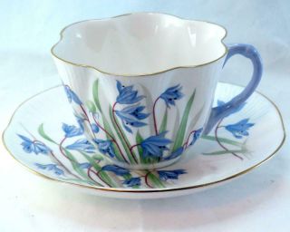 Vtg Shelley Blue Flower Dainty Shaped Tea Cup & Saucer England Fine Bone China