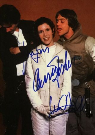 Carrie Fisher,  Mark Hamill,  Harrison Ford Signed 6x8 Photo Autograph