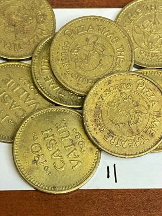 11 x ND one sided SMALL odd size vintage Chuck E Cheese token,  CEC.  866 