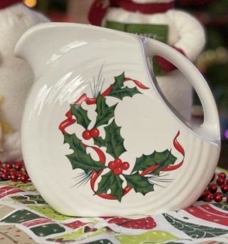 Fiesta Fiestaware Christmas Holly And Ribbon Disc Disk Pitcher 5 1/2” Tall.