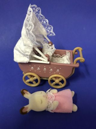 Sylvanian Families Twin Pram Plus Baby Chocolate Eared Rabbit And Bedding