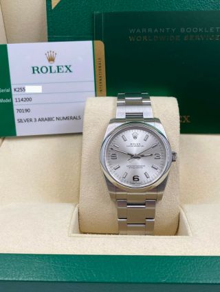 Rolex Oyster Perpetual 114200 Silver Dial Stainless Steel Box Papers