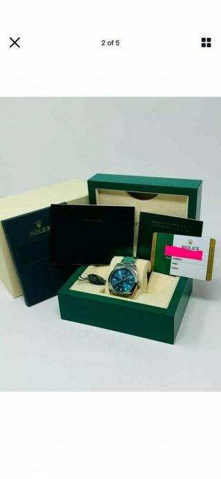 Rolex Milgauss Blue Dial Green Crystal Never Worn Papers Full Set