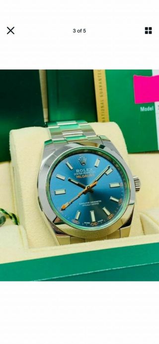 Rolex Milgauss Blue Dial Green Crystal never worn papers full set 2