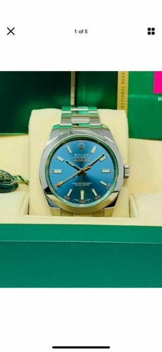Rolex Milgauss Blue Dial Green Crystal never worn papers full set 3