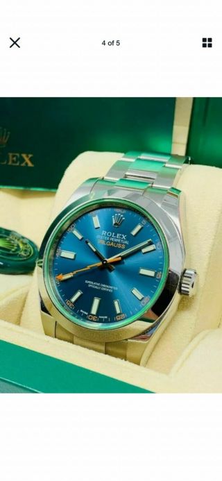 Rolex Milgauss Blue Dial Green Crystal never worn papers full set 4