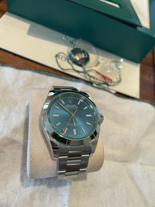 Rolex Milgauss Blue Dial Green Crystal never worn papers full set 5