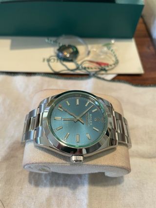 Rolex Milgauss Blue Dial Green Crystal never worn papers full set 6