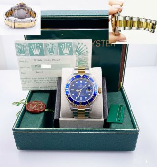 Rolex Submariner 16613 Blue Dial 18k Yellow Gold Stainless Steel Box Paper