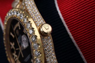 Rolex Day - Date 18038 Diamonds Black Roman Dial Presidential Bracelet