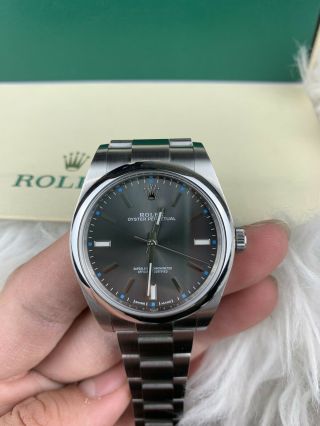 Rolex 114300 Oyster Perpetual Rhodium Dial 39mm Box And Papers Pre - Owned