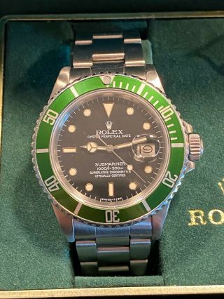 Rolex Submariner Stainless Steel Black Dial.  Box,  Docs.