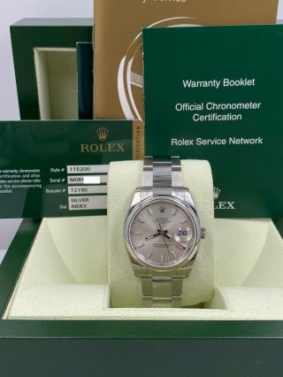 Bnos Rolex Date 115200 Silver Dial Stainless Steel Box Papers Stickers
