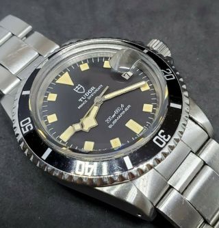 1970s Tudor Submariner Date Black Snowflake Ref.  94110 with Service Papers 3