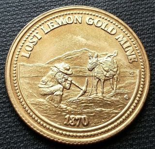 1989 Crowsnest Pass Alberta $1 Trade Dollar - Lost Lemon Gold Mine - Gold Colour