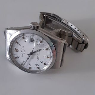 Rolex Date 34 mm Steel Automatic White Roman Oyster Watch 1500 Circa 1972 3