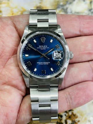 Rolex Date Blue Arabic Dial Ref.  15200 Mens 34mm Stainless Steel Watch