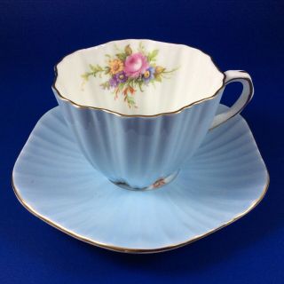 E.  B.  Foley Light Blue And Floral Bone China Ruffled Tea Cup And Saucer