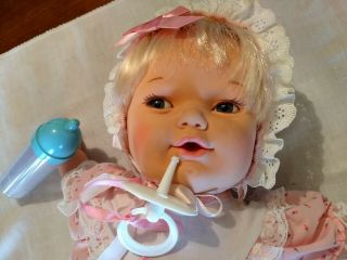 Life like baby doll that coos,  cries and drinks her bottle by Irwin Toys 1990 3