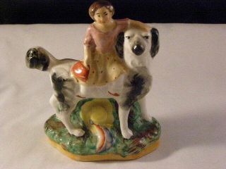 Antique Staffordshire Ware Figurine Of Girl On A Large Dog