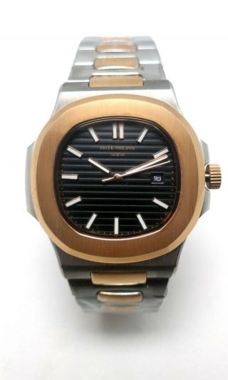 Patek Philippe Nautilus Gold Pelted Steel W Desirable Black Striped Dial