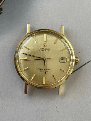 Vintage Omega seamaster deville 14k solid yellow gold,  automatic cal.  560. 3