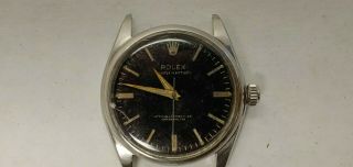 1959 Rolex Oyster Perpetual 6564 Stainless Steel Cal.  1030 Gilt Black Dial