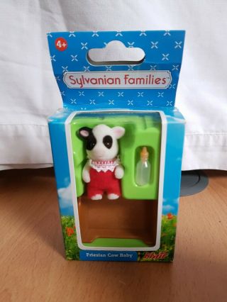 Sylvanian Families Friesian Cow Baby.  Boxed