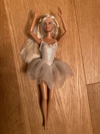Barbie doll with Jointed arms,  sports clothing and accessories,  exc 2