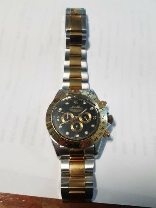 Rolex Daytona Gold Watch With Stones In Hour Ports.  Some Links Missing.