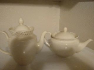 1 Go Dinger.  Cream lace Lg.  9in.  Fine Porcelain Teapot,  an 1 coffee pot. 2