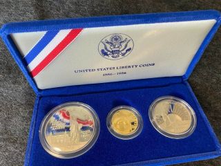 1886 - 1986 U.  S.  Liberty Coins - - 3 Coin Set W/ $5 Gold Coin,  Sleeve,
