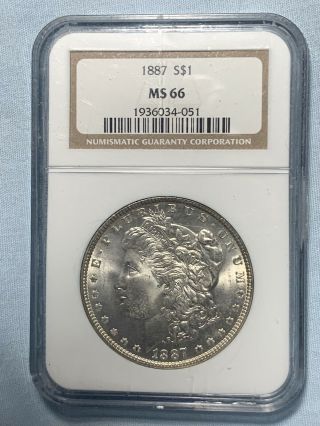 1887 Morgan Silver Dollar Ngc Ms 66 With Attractive Light Gold Tone