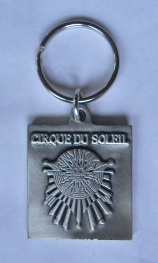 Cirque Du Soleil Key Chain,  Cast Pewter Metal,  Sun & Rays Logo,  Canada,  Exc.