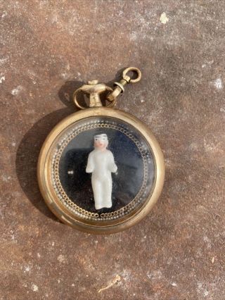 Antique Frozen Charlotte In A Pocket Watch