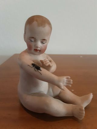 Vintage Unmarked Bisque Porcelain Piano Baby Bug On Arm,  4 "