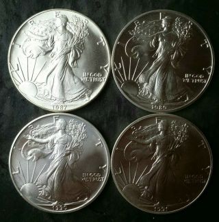1987,  1989,  1990,  And 1991 $1 American Silver Eagle Dollars