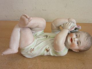 Antique German Heubach Porcelain Bisque Figurine Piano Baby Laying Boy W/ Shell