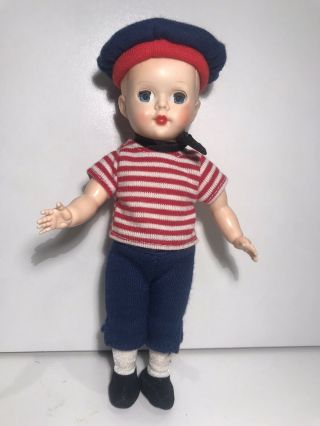 Early English 7.  5 Inches Hard Plastic Doll,  Wearing Madeleine Bemelmans Cloths