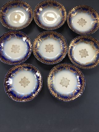 Eight Antique Victoria Carlsbad Austria Flow Blue Dessert Bowls