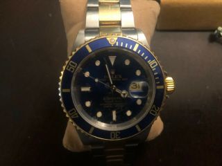 World traveling 2005 Rolex submariner blue dial SS & 18 ct in 2