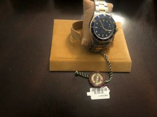 World traveling 2005 Rolex submariner blue dial SS & 18 ct in 5